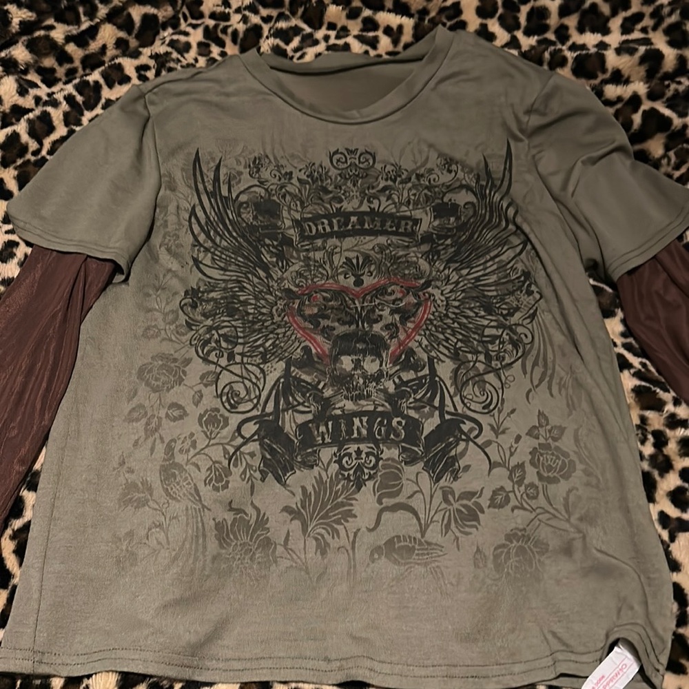 Olive green tee with mesh sleeves.